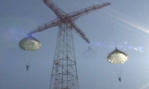 250 Foot Tower, two trainnies jumping with parachutes